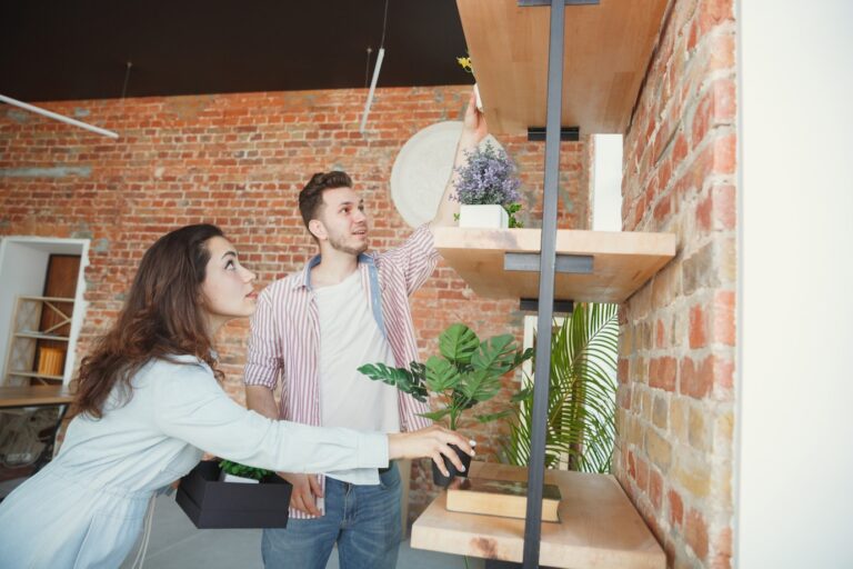 new-life-young-couple-moved-new-house-apartment-look-happy-confident_155003-26917